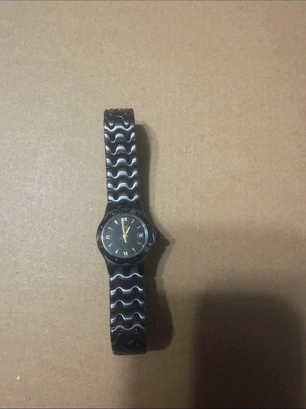 Men's Black Wave-Link Wristwatch - [Brand Not Visible]